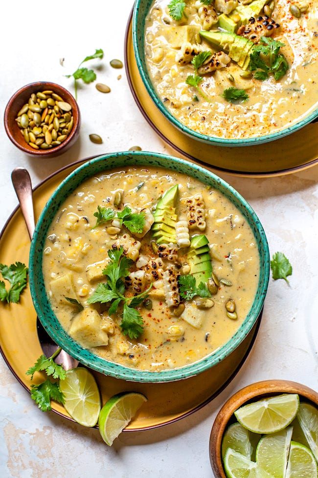 Bowl of corn chowder recipe by Maria Lichty of @twopeasandtheirpod