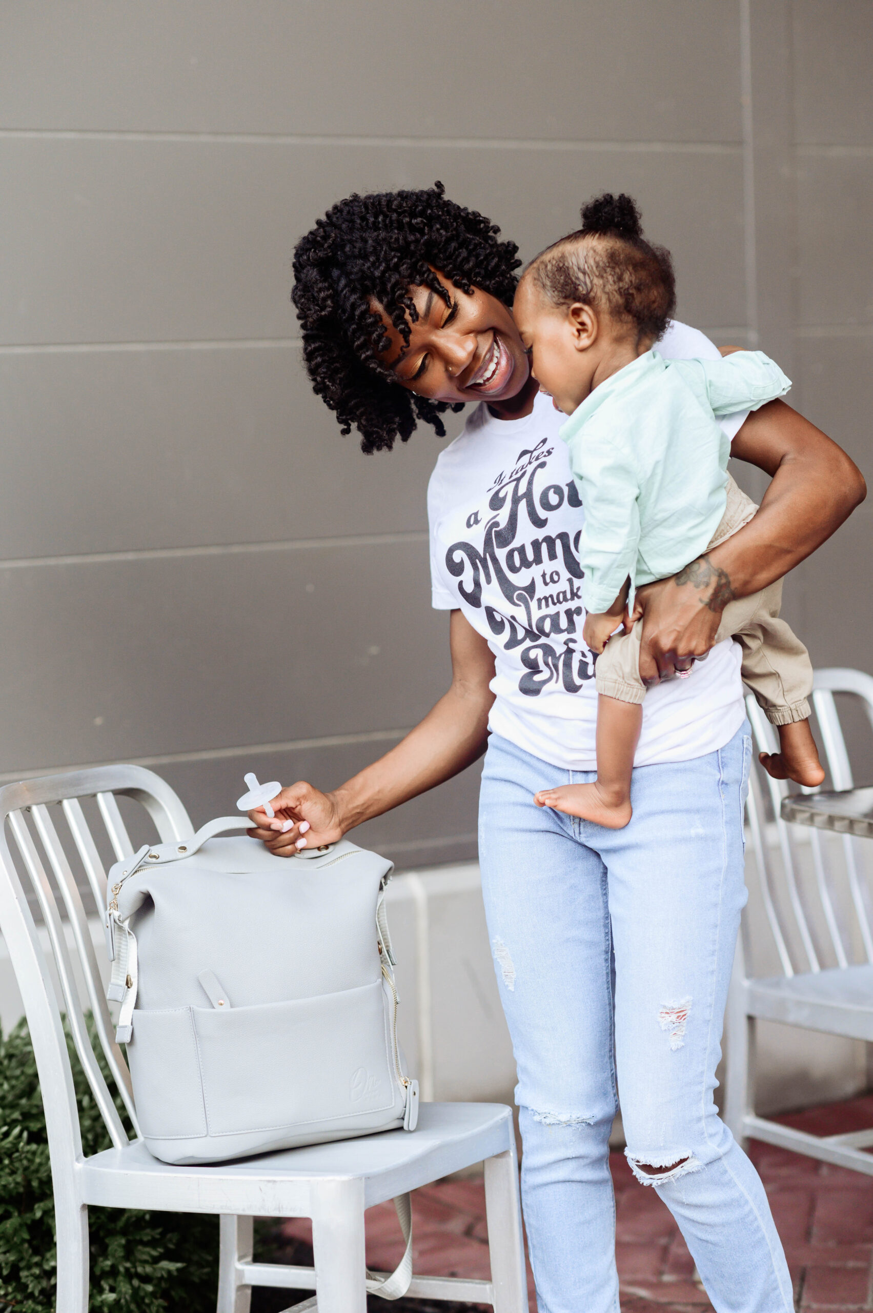 One pumped Mama apparel on a mom and a small toddler 