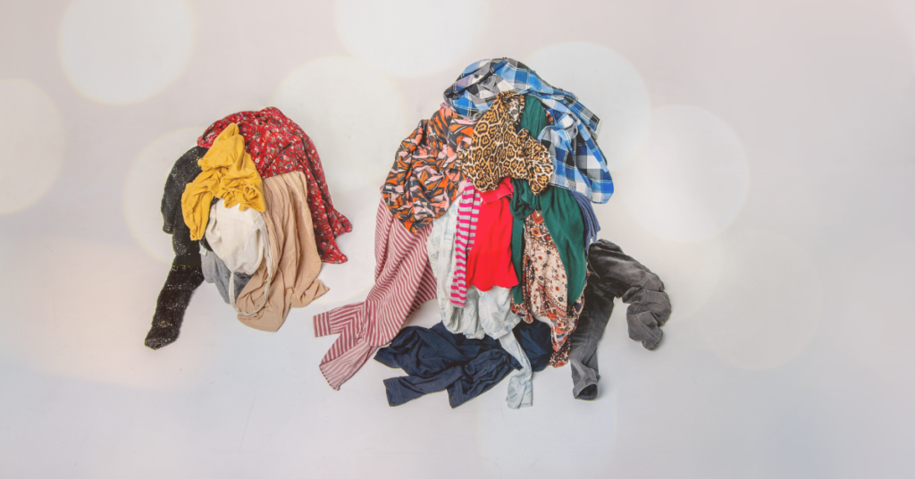 Two piles of sorted clothes, how to pack smarter