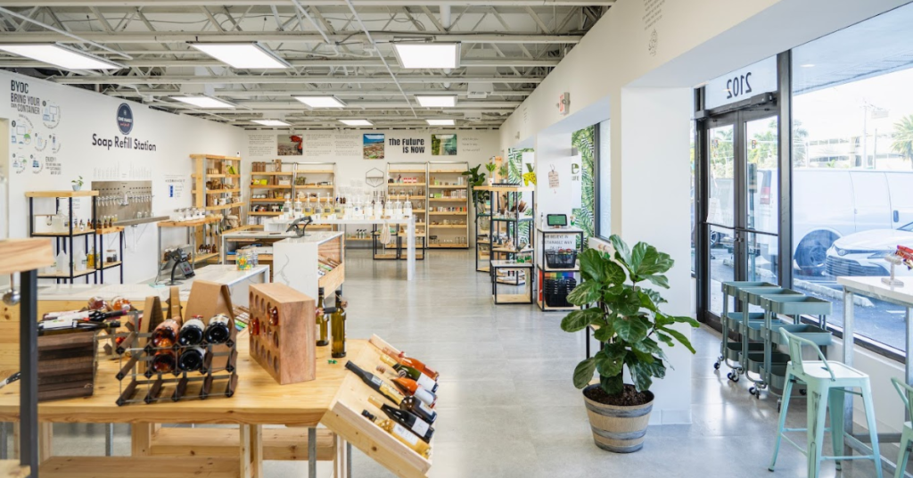 Interior view of a zero waste store, Verde Market. Open shelves featuring a wide variety of bulk home items to shop.